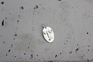 life faces is handmade and unique pendants in recycled sterling silver