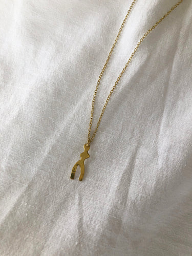 dancing body abstract necklace. gold plated necklace