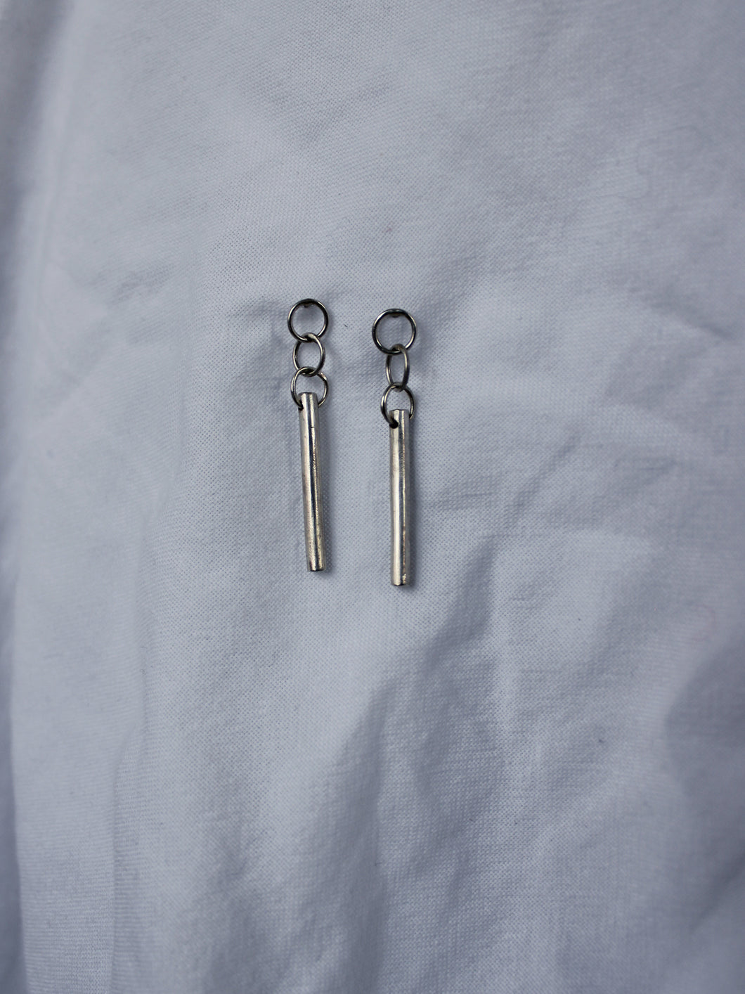 Nordic minimalistic design earrings. Handmade in recycled sterling silver