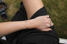 Handmade sustainable jewellery. Here shown minimal cuff bracelet and rings
